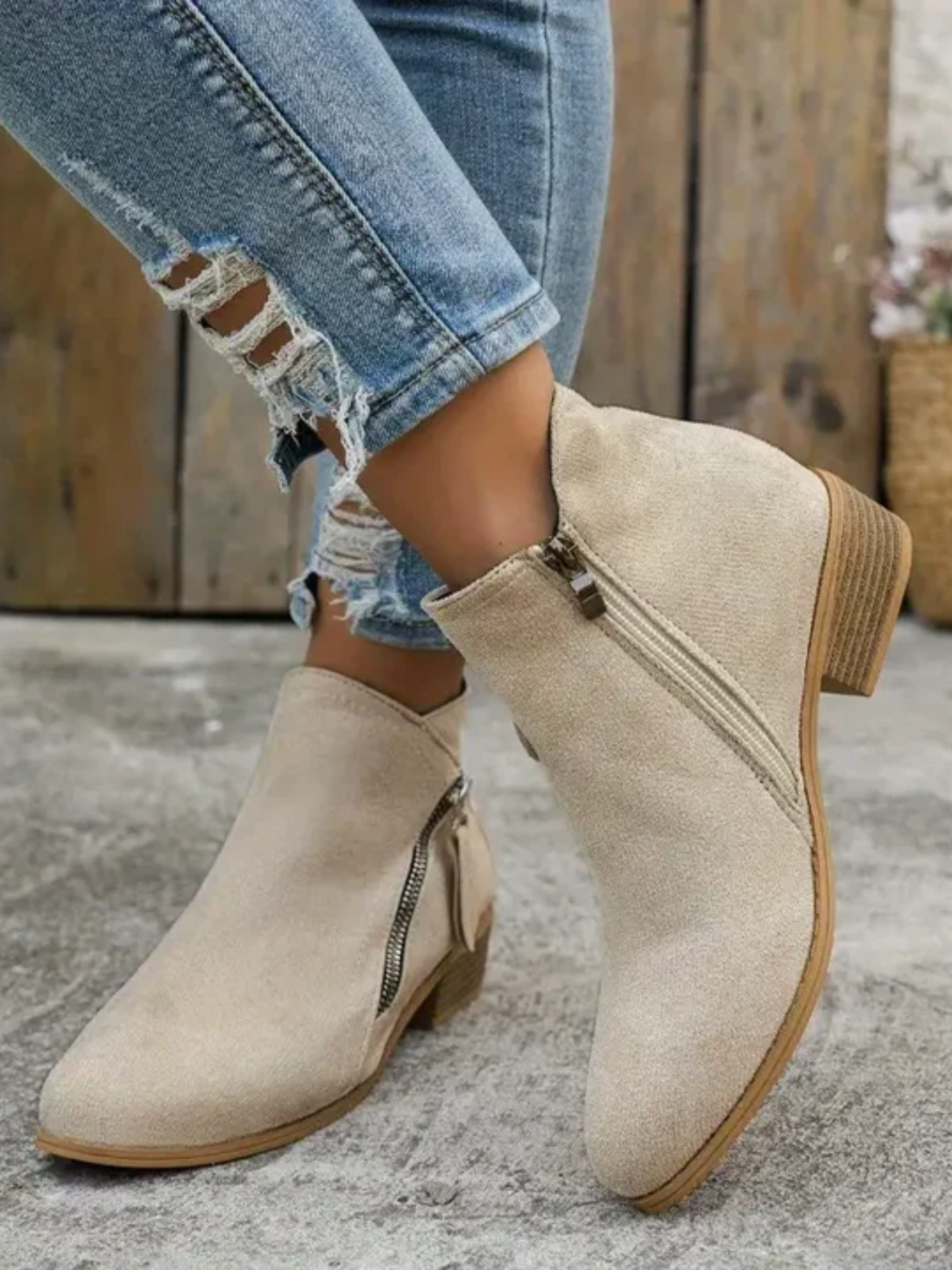 Modne botki na obcasie z zamkiem