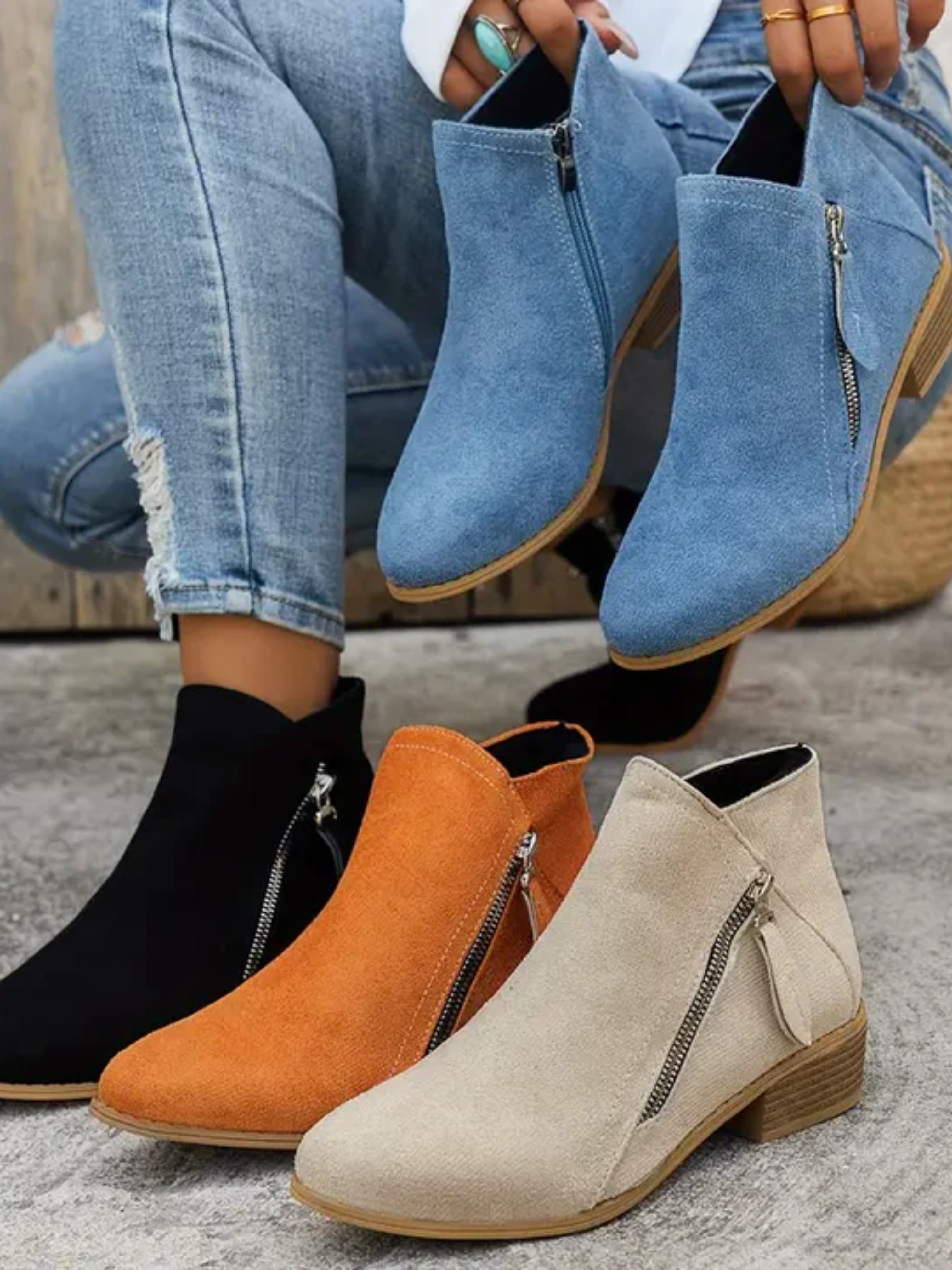 Modne botki na obcasie z zamkiem